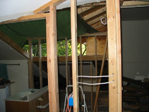 A new hole in the roof for our master bathroom whirlpool dormer